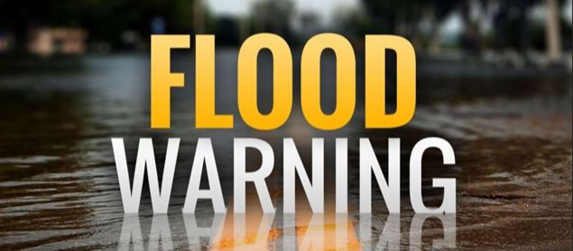 Flood Warning Image of water with Flood Warning text